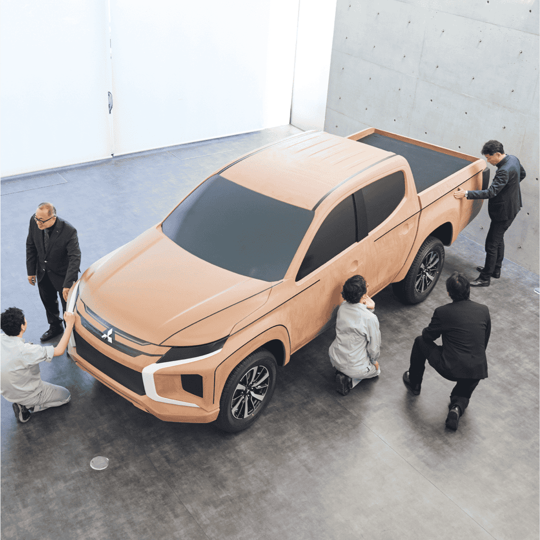 designers workign on a car